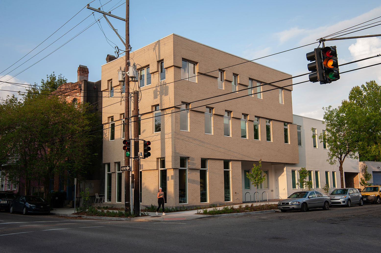 exterior shot of sand-colored brick building