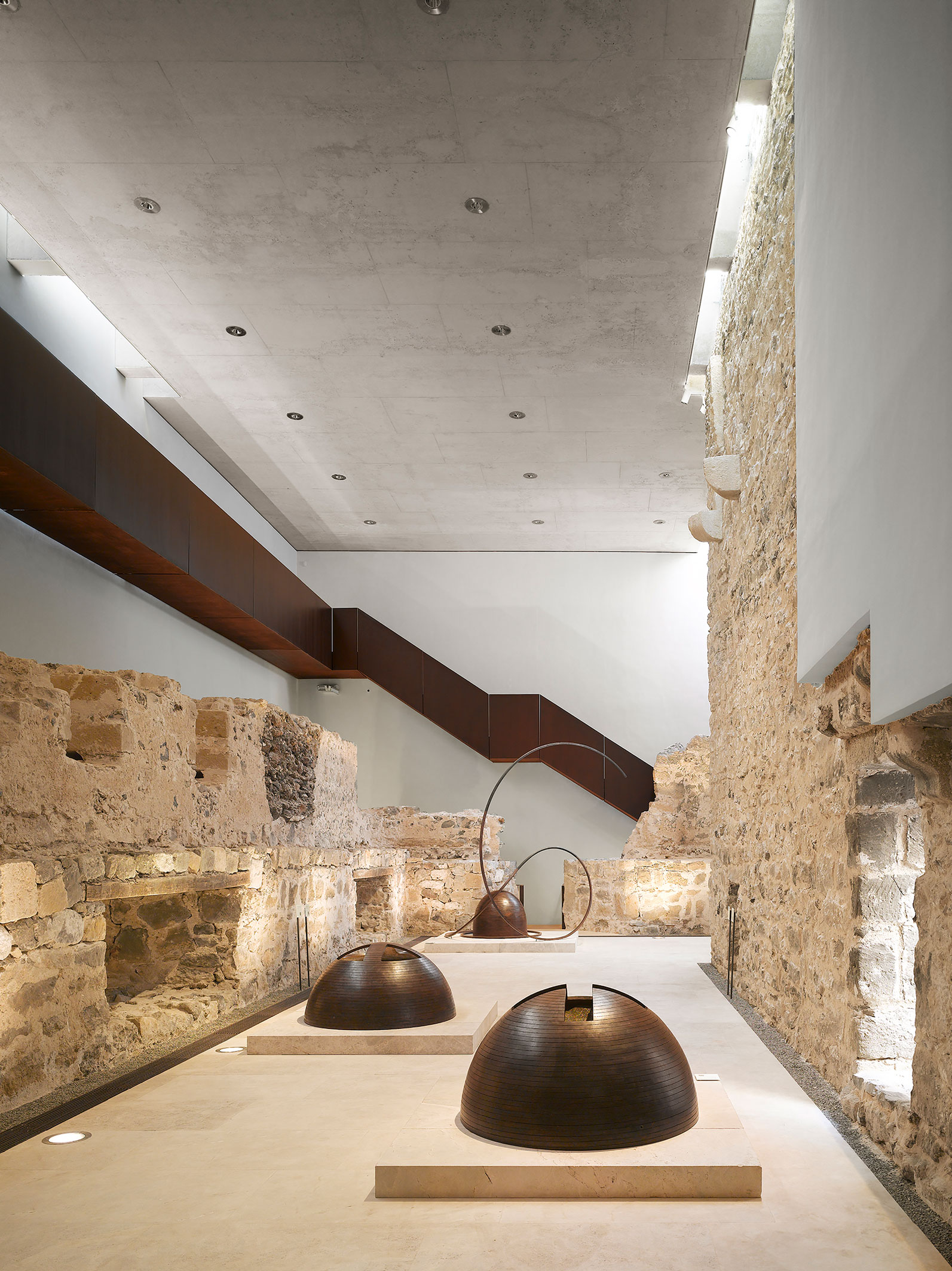 Interior photo of a room made of concrete wood and stone